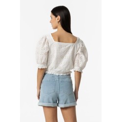 Blusa da donna e ragazza con scollo a V e maniche corte a sbuffo. Arricciature anteriori regolabili con fiocco con nappine. Elas