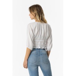 Blusa da donna con scollo a V e maniche corte a sbuffo. Dettaglio di elastici e fiocco. 10054839 Laranja b 001 White Tiffosi Tes